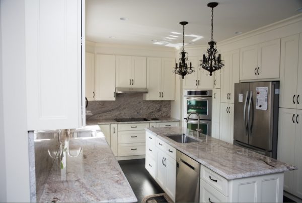 fashion pearl white cabinets with island and marble counter