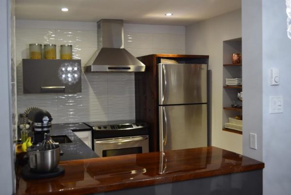 milano white and slate custom kitchen with wood countertop